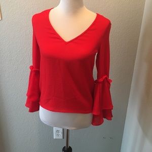 Great Fiery red blouse with sleeve detail